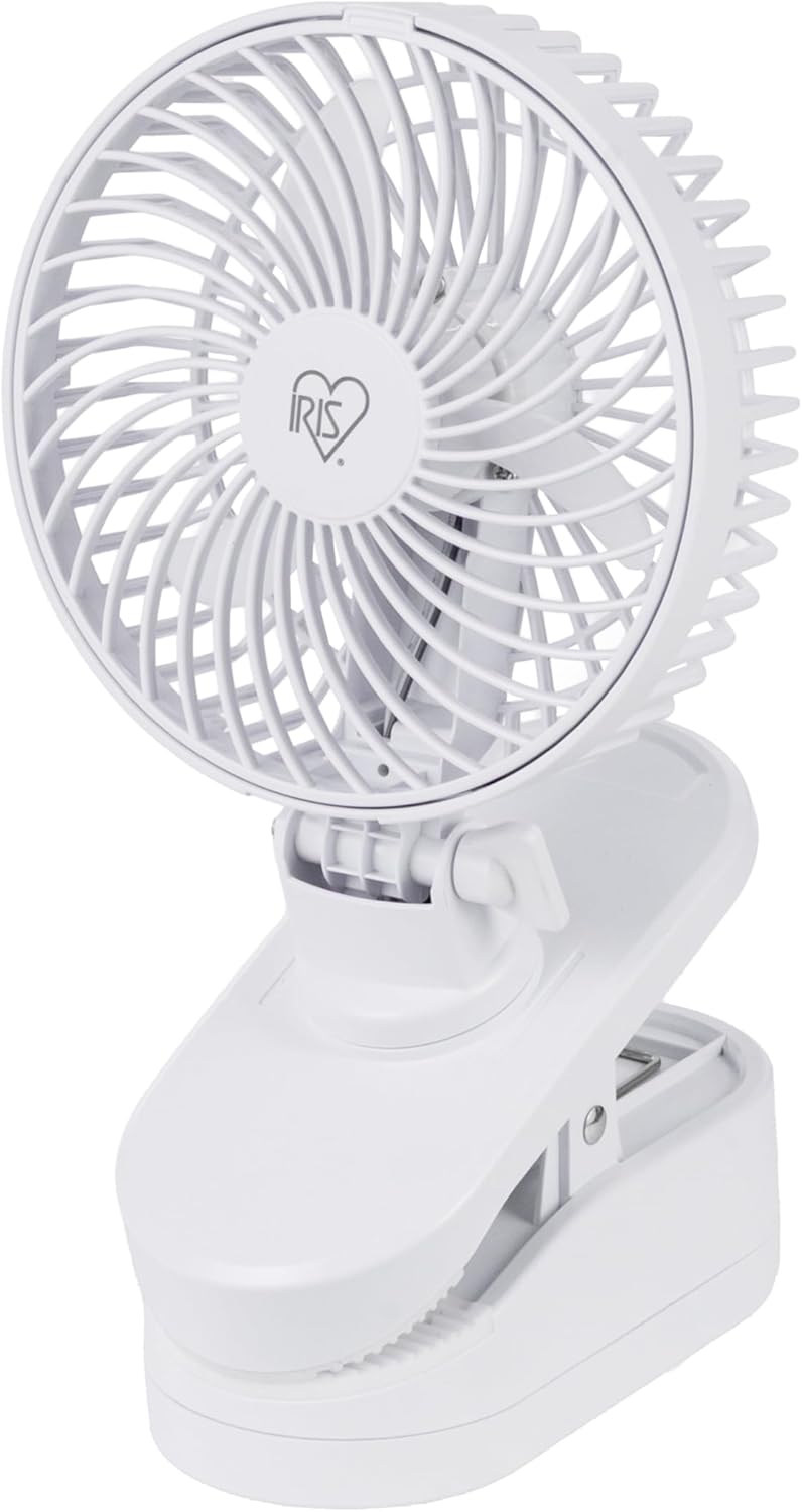 White clip-on fan on a white background