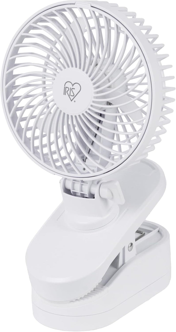 White clip-on fan on a white background