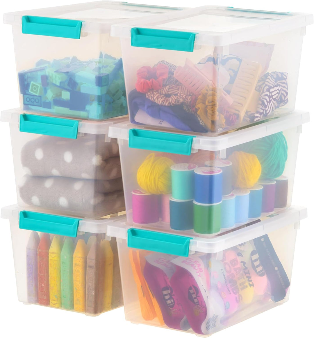 Stack of clear storage boxes with colorful items inside, featuring turquoise lids.